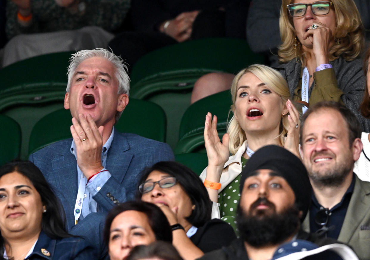 LONDON, ENGLAND - JULY 05: Phillip Schofield and Holly Willoughby attend day 7 of the Wimbledon Tennis Championships at the All England Lawn Tennis and Croquet Club on July 05, 2021 in London, England. (Photo by Karwai Tang/WireImage)