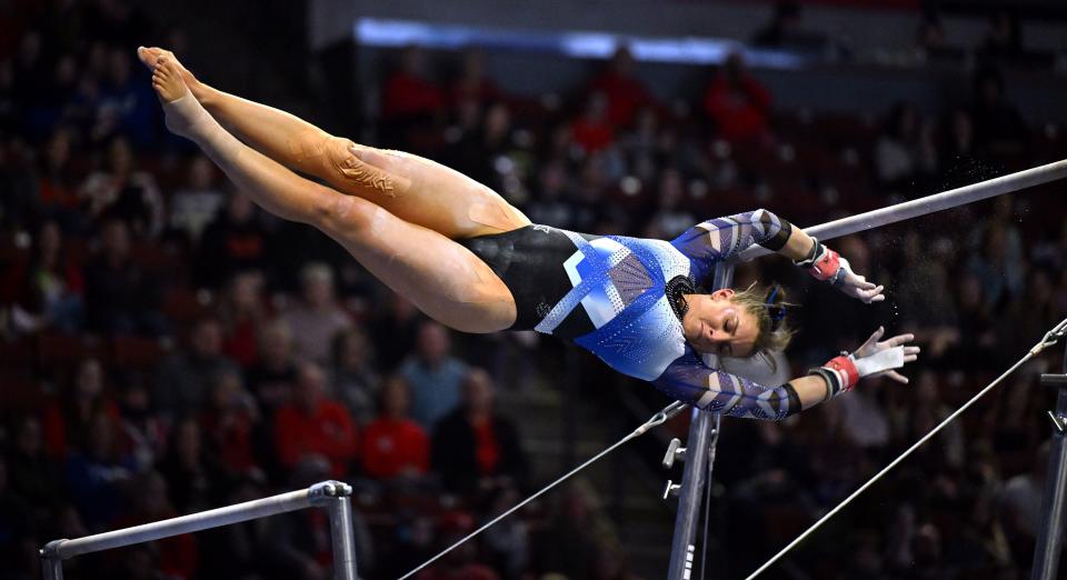 BYU’s Linsey Hunter-Kempler, executes her bars routine as BYU, Utah, SUU and Utah State meet in the Rio Tinto Best of Utah Gymnastics competition at the Maverick Center in West Valley City on Monday, Jan. 15, 2024. | Scott G Winterton, Deseret News