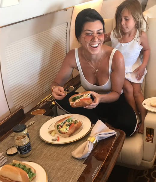 <p>It looks like “Coach” is a foreign word to all Kardashian kids, as Kourtney’s daughter Penelope got in on the posh life of a jetsetter early on, as well. By the way, their airplane food doesn’t look like ours. (Photo: <a rel="nofollow noopener" href="https://www.instagram.com/p/BVSnHXojarn/" target="_blank" data-ylk="slk:Kourtney Kardashian via Instagram;elm:context_link;itc:0;sec:content-canvas" class="link ">Kourtney Kardashian via Instagram</a>) </p>