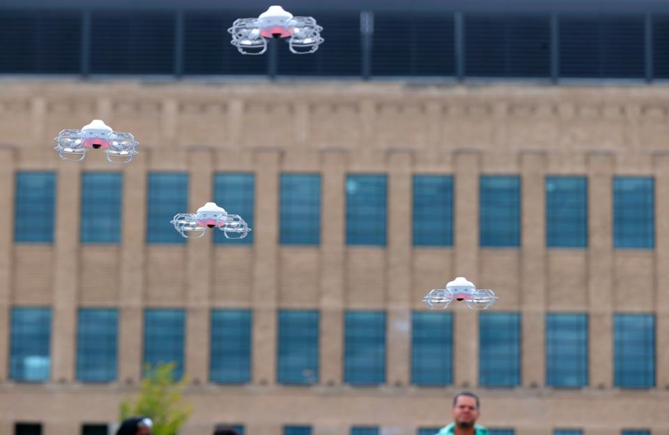 Small drones programed by Willian Piao, 30 of New York City and with Drone Cadet fly in formation during a drone light show demonstration for kids during youth drone demo day put on by Code 313 in front of Ford’s Michigan Central Station in Detroit on Saturday, September 9, 2023.