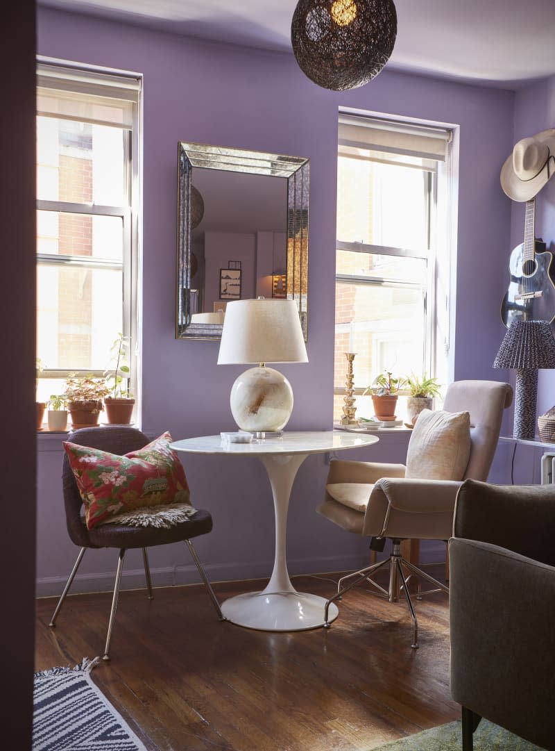 Lamp with marble base on bistro dining table.