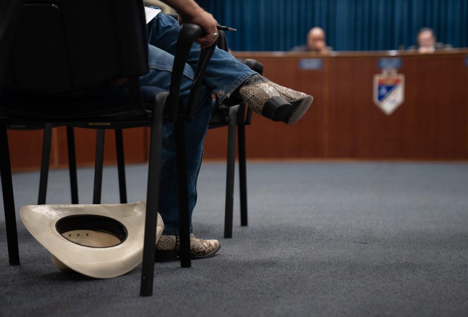 Mark Gran, an industrial water user, takes notes during an Imperial Irrigation District meeting on May 17, 2022, in William R. Condit Auditorium in El Centro, California. The board was considering a plan to restrict the year’s use — a harsh new reality for some.