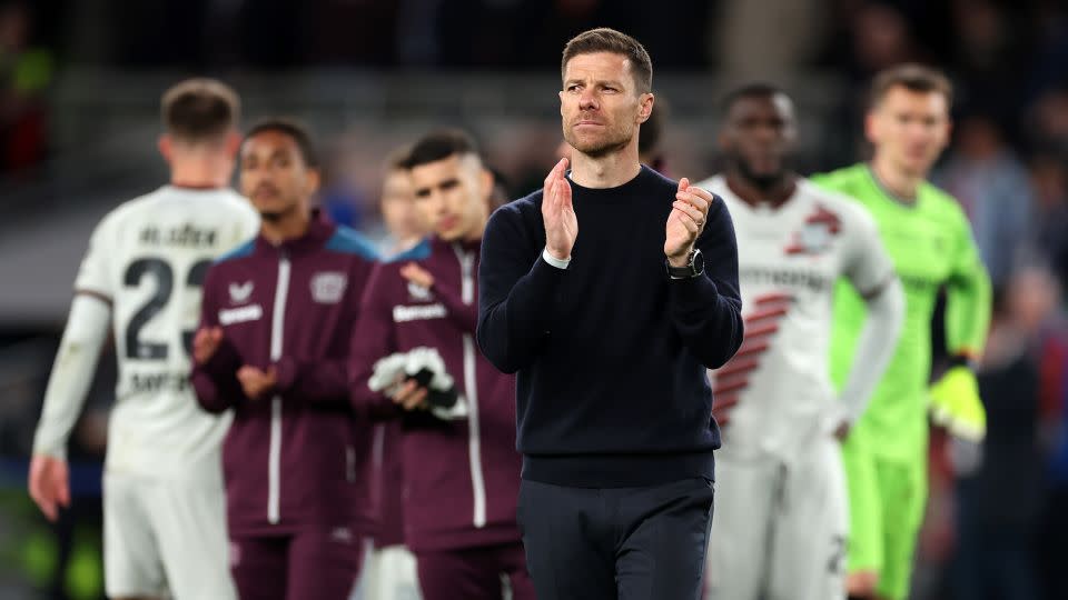 Alonso applauds the fans after Leverkusen's Europa League final defeat. - Alex Grimm/Getty Images