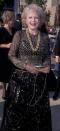 <p>Taking cues from Mr. T, the memorable Betty White donned an oversized, gold chain necklace with a black and gold sequined dress. </p>