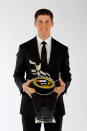 LAS VEGAS, NV - DECEMBER 02: Ninth place driver Denny Hamlin poses with his trophy during the NASCAR Sprint Cup Series Champion's Week Awards Ceremony at Wynn Las Vegas on December 2, 2011 in Las Vegas, Nevada. (Photo by Chris Graythen/Getty Images for NASCAR)