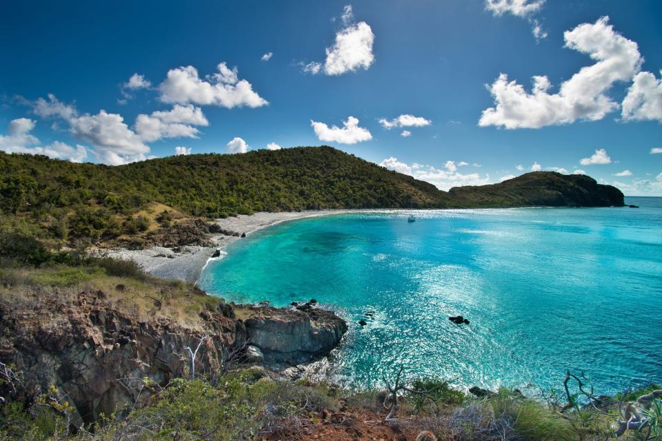 Virgin island lagoon and beach landscape in the tropics and mountains