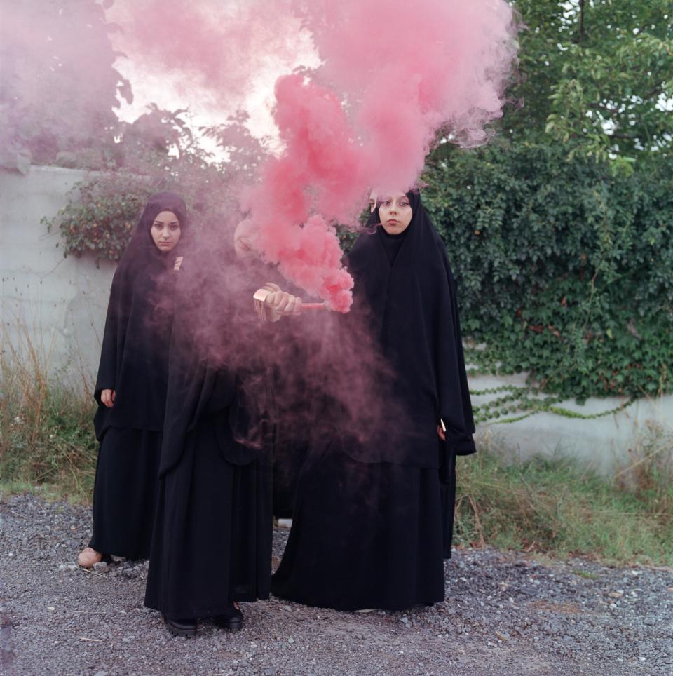 “Smoke and mirrors, fantasy and real life, are a magician’s tools to create illusions; but photographers can also use those tools,” says photographer Sabiha Çimen of her image, Qur’an School students having fun with a pink smoke bomb at a picnic event, in Istanbul, Turkey.