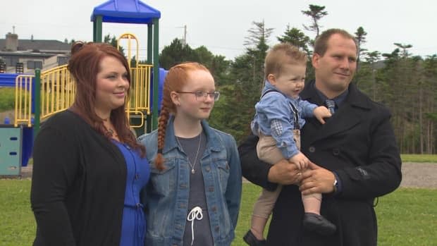 Pam Myles, along with her partner and two of her children, commemorated her late son at a park naming ceremony on Tuesday, one year after his death. (CBC - image credit)