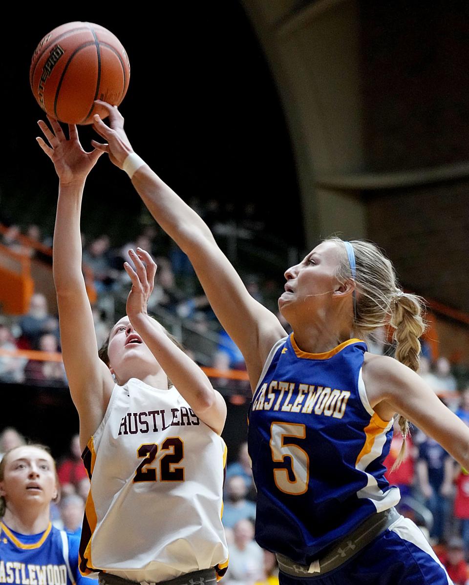 Castlewood's Maddie Horn (5) defends against Ethan's Ella Pollreisz during their first-round game in the state Class B high school girls basketball tournament on Thursday, March 9, 2023 in the Huron Arena. Ethan won 55-53 in overtime.