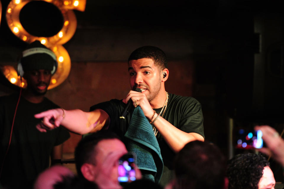 PARK CITY, UT - JANUARY 21:  Rapper Drake performs at Comedy with Aziz Ansari and a Drake Performance presented by Bing at The Bing Bar on January 21, 2012 in Park City, Utah.  (Photo by Michael Buckner/Getty Images for Bing)