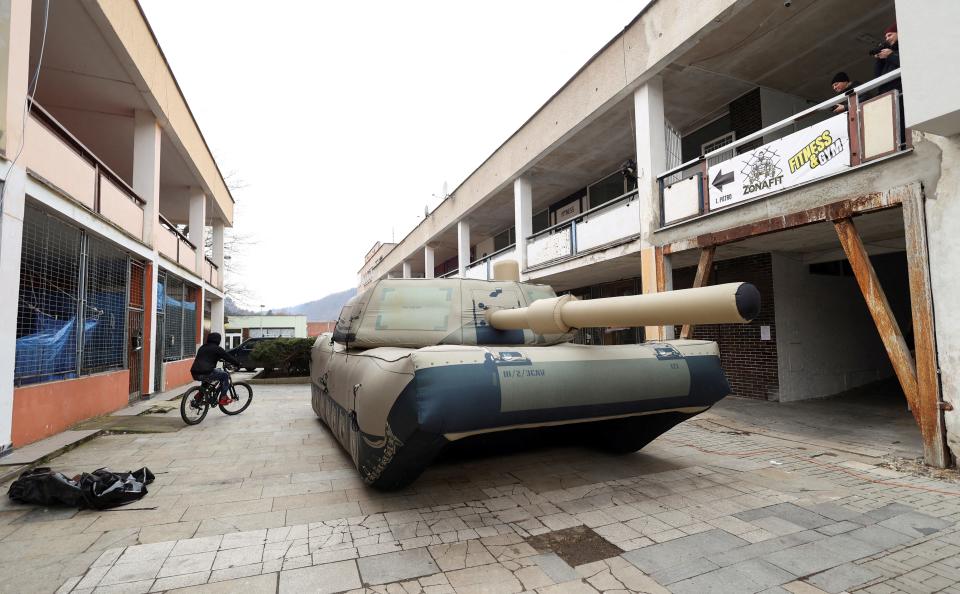 An inflatable decoy of a military vehicle, which is used to confuse enemy attacks, is displayed during a media presentation in Decin, Czech Republic, March 6, 2023.