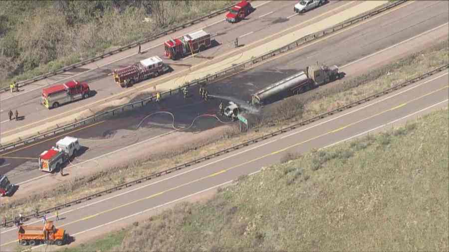 First responders at the scene of a tanker trailer fire on Interstate 70 in Morrison on May 16, 2024. (KDVR)