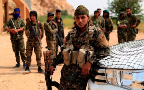 SDF forces have been fighting to drive Isil from Hajin - Credit: DELIL SOULEIMAN/AFP/Getty Images