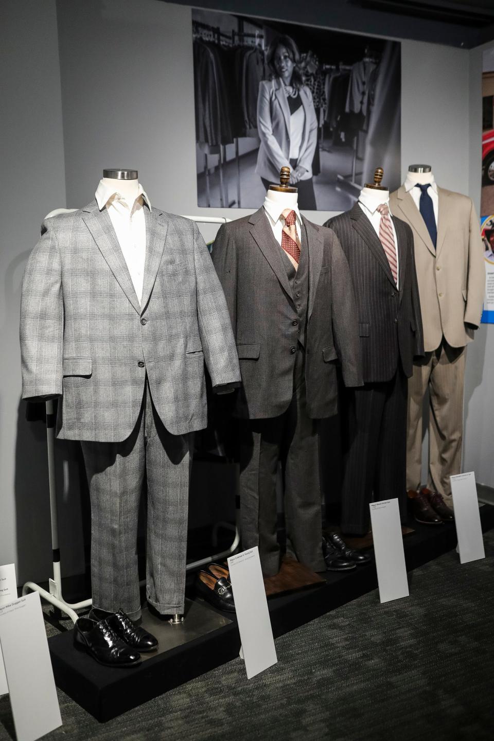 From left, suits worn by Mayor Mike Duggan, Mayor Coleman Young, Mayor Dennis Archer and Mayor Kenneth Cockrel Jr. during the Hustle exhibition at Detroit Historical Museum in Detroit on Wednesday, Nov. 1, 2023.