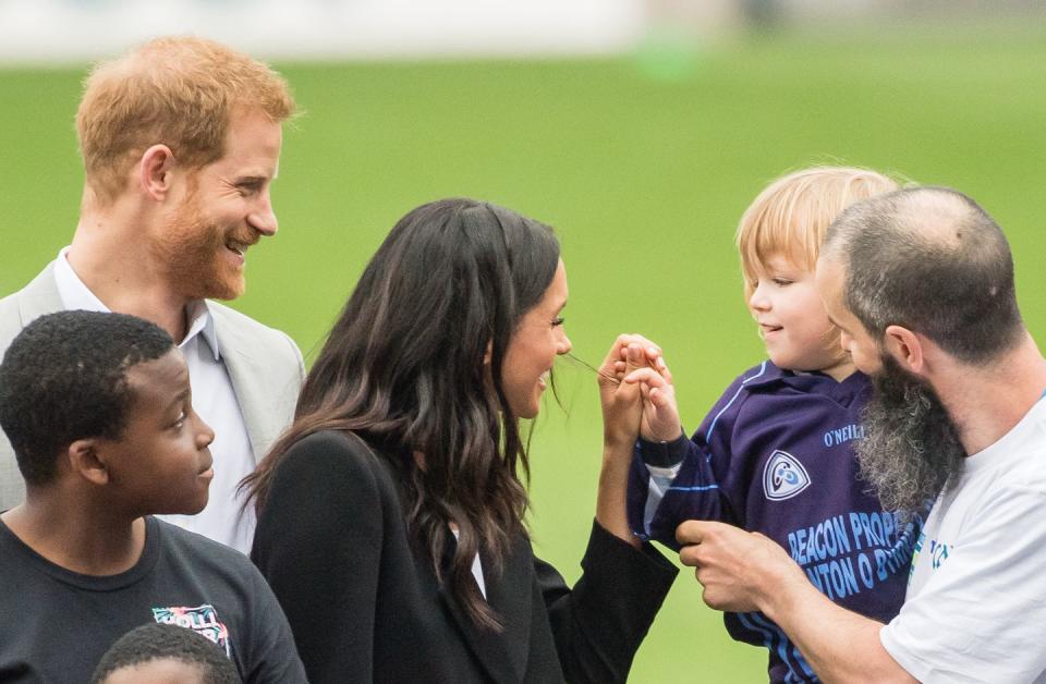 <p>During their visit to Ireland in July 2018, the couple met with an adorable child who tried to steal some of the duchess' hair. I mean, you can't blame them! </p>