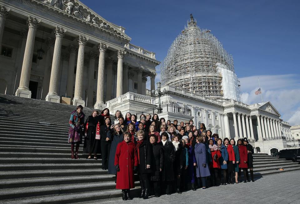 Sixty-five Democratic female congressional lawmakers stand on the Capitol steps in January 2015. <a href="https://media.gettyimages.com/id/461128670/photo/house-minority-leader-nancy-pelosi-holds-ceremonial-swearing-in-for-65-house-democratic-women.jpg?s=612x612&w=gi&k=20&c=GZr1y9-Z-Nif4V8Z113vtGanP-hZ3QmdkKhyd32oncE=" rel="nofollow noopener" target="_blank" data-ylk="slk:Win McNamee/Getty Images;elm:context_link;itc:0;sec:content-canvas" class="link ">Win McNamee/Getty Images</a>