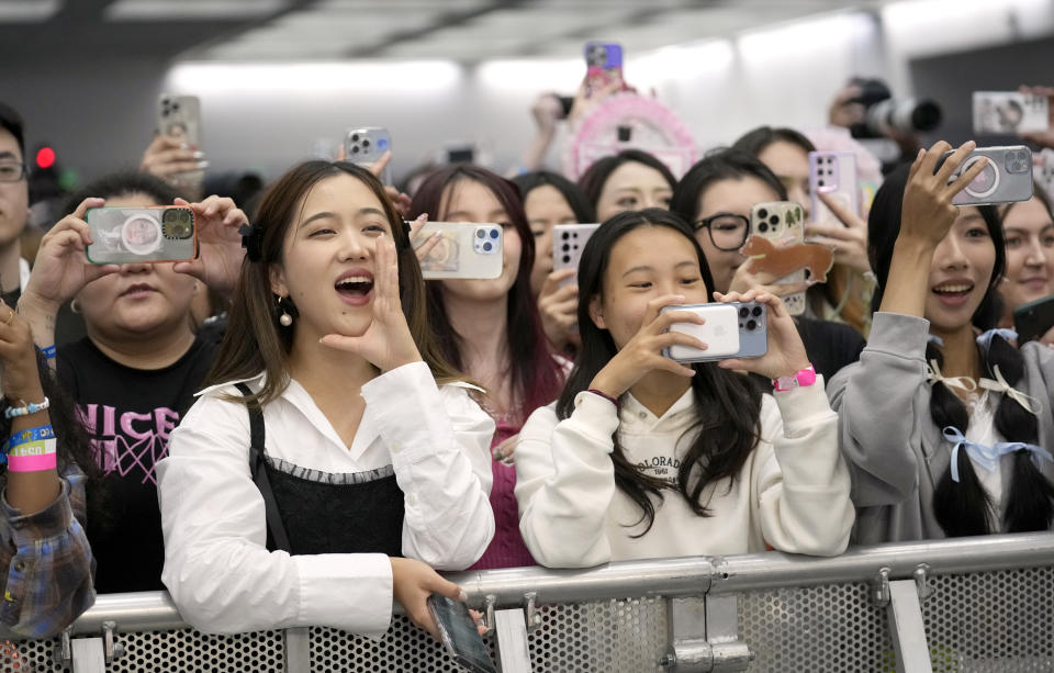 Fans attend KCON at the Los Angeles Convention Center on Friday, Aug. 18, 2023. (AP Photo/Chris Pizzello)