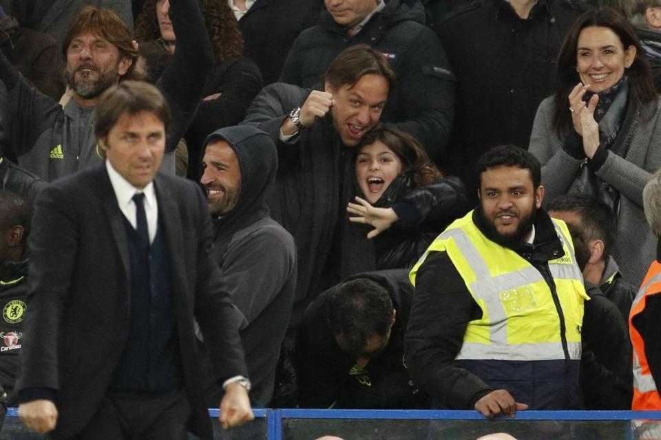 The Conte family cheer at a 2017 Chelsea match (Reuters)