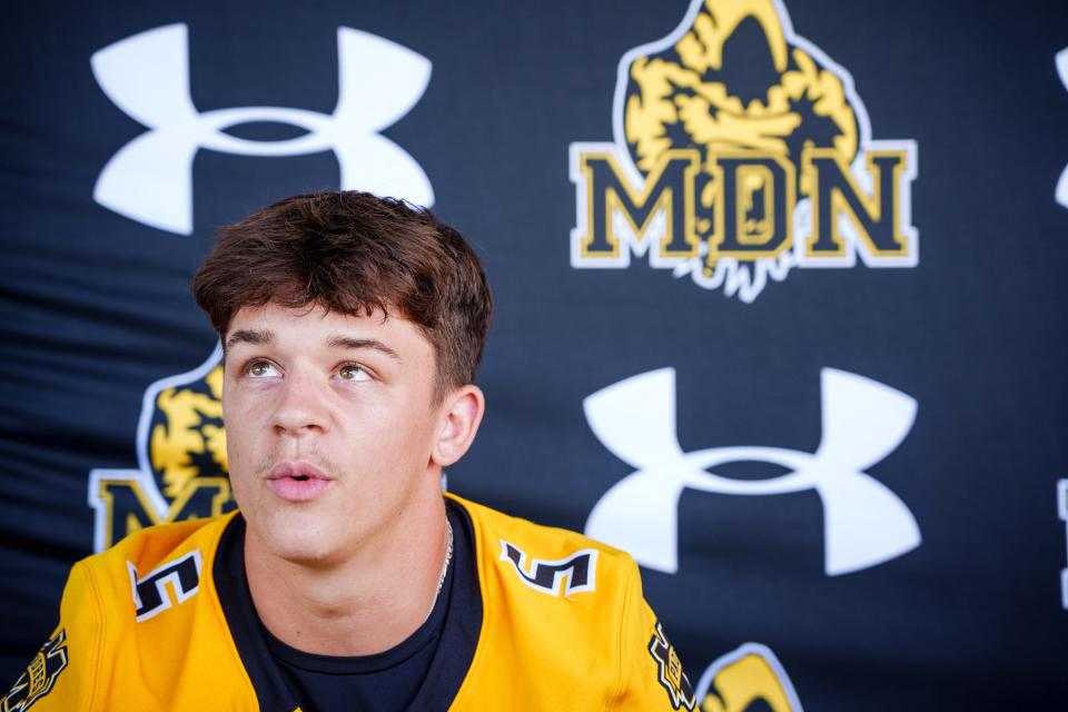 Marcos De Niza wide receiver, Mason Stromstad, speaks to a reporter during Tempe Union School District's Football Media Day at Valle Luna Mexican Restaurant on Aug. 6, 2022, in Chandler, AZ.