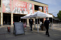 The entrance to the Grand Ole Opry House appears prior to the start of the 55th annual Academy of Country Music Awards on Wednesday, Sept. 16, 2020, in Nashville, Tenn. (AP Photo/Mark Humphrey)