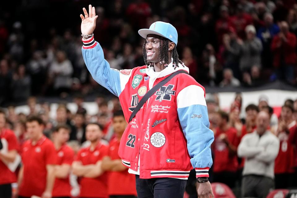 Jan 20, 2024; Columbus, Ohio, USA; Ohio State Buckeyes wide receiver Marvin Harrison Jr. is recognized during the NCAA men’s basketball game against the Penn State Nittany Lions at Value City Arena.