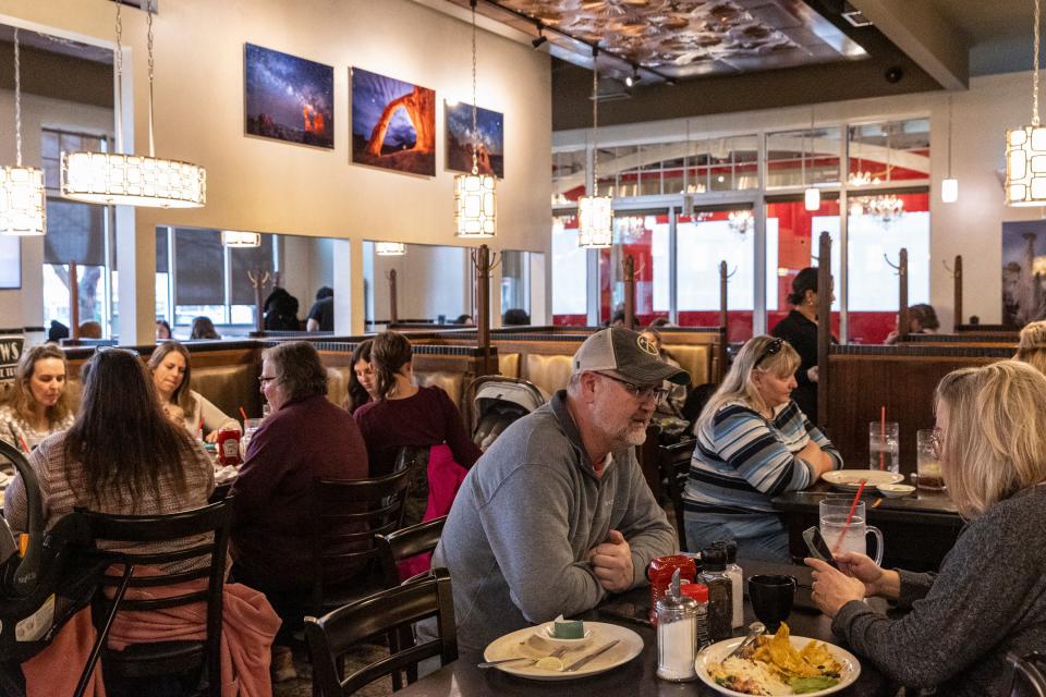 Customers enjoy meals at TRUreligion Pancake & Steakhouse in Orem on Thursday, Jan. 25, 2024. The owner, Jim Leany, is committed to creating a space that feels welcoming and harks back to the Salt Lake City staple, Lamb’s Grill, with original booths, tables, doors and chairs. | Marielle Scott, Deseret News