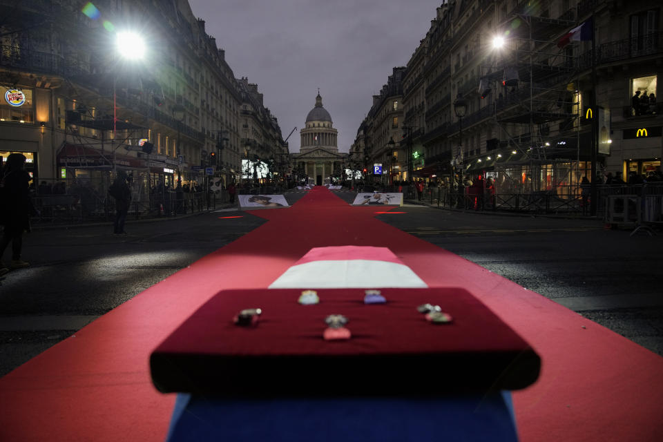 A coffin carrying soils from the U.S., France and Monaco will be deposited inside the Pantheon monument, rear, in Paris, France, Tuesday, Nov. 30, 2021, where Josephine Baker is to symbolically be inducted, becoming the first Black woman to receive France's highest honor. Her body will stay in Monaco at the request of her family. (AP Photo/Christophe Ena)