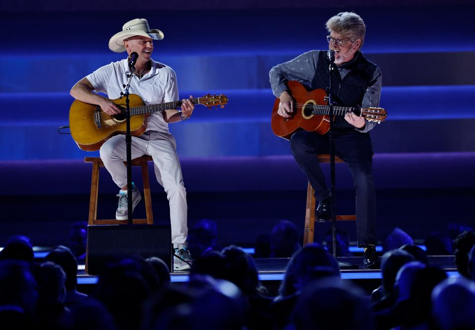 Kenny Chesney, left, and Mac McAnally perform during the 57th Annual Country Music Association Awards in Nashville, Tenn., Wednesday, Nov. 8, 2023.