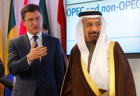 Russia's Energy Minister Alexander Novak (L) and Saudi Arabia's Energy Minister Khalid al-Falih leave a news conference after a meeting of the Organization of the Petroleum Exporting Countries (OPEC) in Vienna, Austria, December 10, 2016. REUTERS/Heinz-Peter Bader