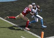 <p>Carolina Panthers’ Ted Ginn (19) reaches for the ball as San Francisco 49ers’ Tramaine Brock (26) defends in the first quarter of an NFL football game in Charlotte, N.C., Sunday, Sept. 18, 2016. The pass was ruled incomplete. (AP Photo/Bob Leverone) </p>