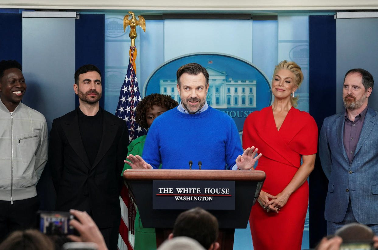 "Ted Lasso" star Jason Sudeikis, with press secretary Karine Jean-Pierre and his fellow cast members, at a press briefing on March 20 to discuss the importance of addressing mental health to promote overall well-being. (Kevin Lamarque/Reuters)