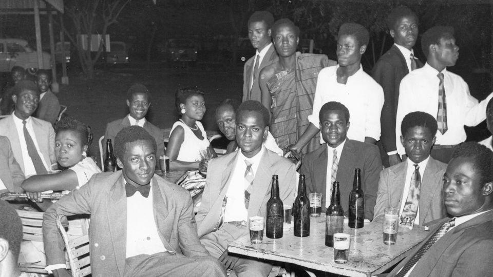 One of Bruce-Vanderpuije's photos shows people socializing in Accra in 1958. - J. K. Bruce Vanderpuije/Courtesy Deo Gratias Studio/Efie Gallery