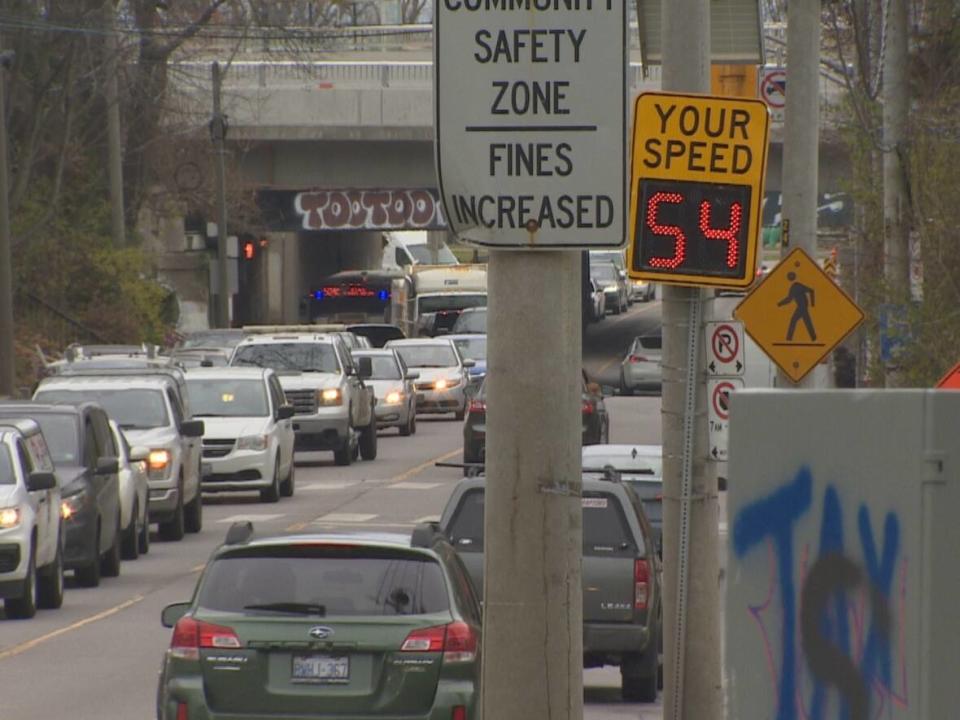 Cars travel south on Parkside Drive passing by one of the city's automated speed cameras. Advocates say the camera alone isn't enough to deter people from speeding in the area. (Doug Husby - image credit)