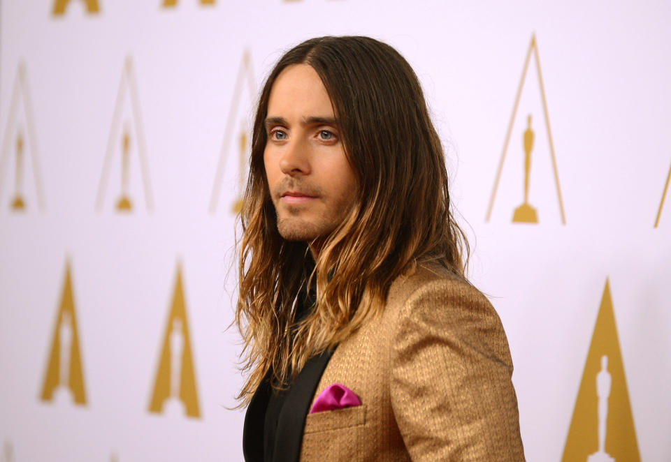 FILE - In this Monday, Feb. 10, 2014 file photo, actor Jared Leto arrives at the 86th Oscars Nominees Luncheon, in Beverly Hills, Calif. Leto is nominated for an Academy Award for performance by an actor in a supporting role in the film, "The Dallas Buyer's Club." The key to making a red carpet splash is color; and men are getting more colorful like Leto at the nominees luncheon. (Photo by Jordan Strauss/Invision/AP)