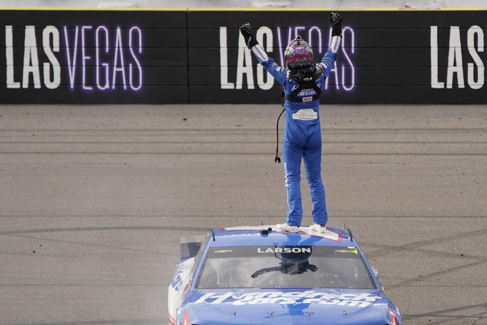 Kyle Larson celebrates after winning a NASCAR Cup Series auto race Sunday, March 7, 2021, in Las Vegas. (AP Photo/John Locher)