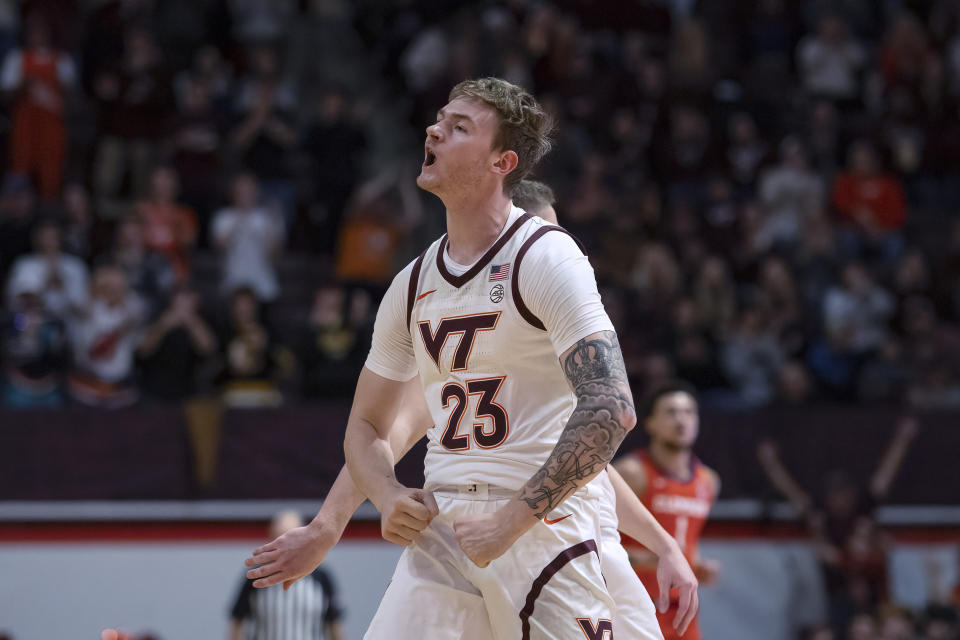 Virginia Tech's Tyler Nickel celebrates after making a 3-pointer against Clemson during the first half of an NCAA college basketball game Wednesday, Jan. 10, 2024, in Blacksburg, Va. (AP Photo/Robert Simmons)