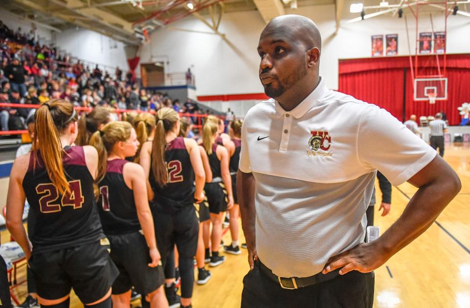 Webster County head coach Brock Stone, Sr. looks off court after loosing to Madisonville as the Webster County Lady Trojans play the Madisonville Lady Maroons in the Second Region semifinals at Christian County High School Friday, March 6, 2020.