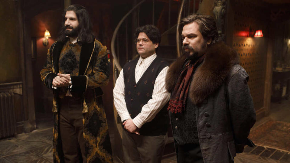 Protect Ya Neck: Nandor (Kayvan Novak), Guillermo (Harvey Guillen) and Laszlo (Matt Berry) receive visitors in the FX series "What We Do In The Shadows"