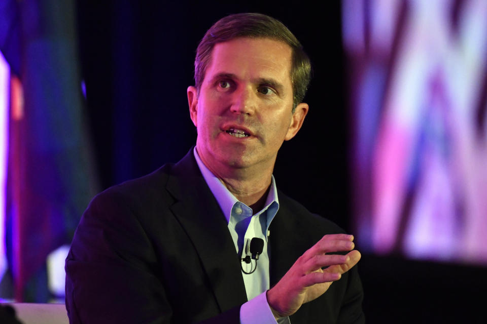 Kentucky Gov. Andy Beshear responds to a question from the moderator during the Gubernatorial Forum at the 2023 Kentucky Chamber of Commerce annual meeting dinner in Louisville, Ky., Wednesday, Sept. 20, 2023. (AP Photo/Timothy D. Easley)