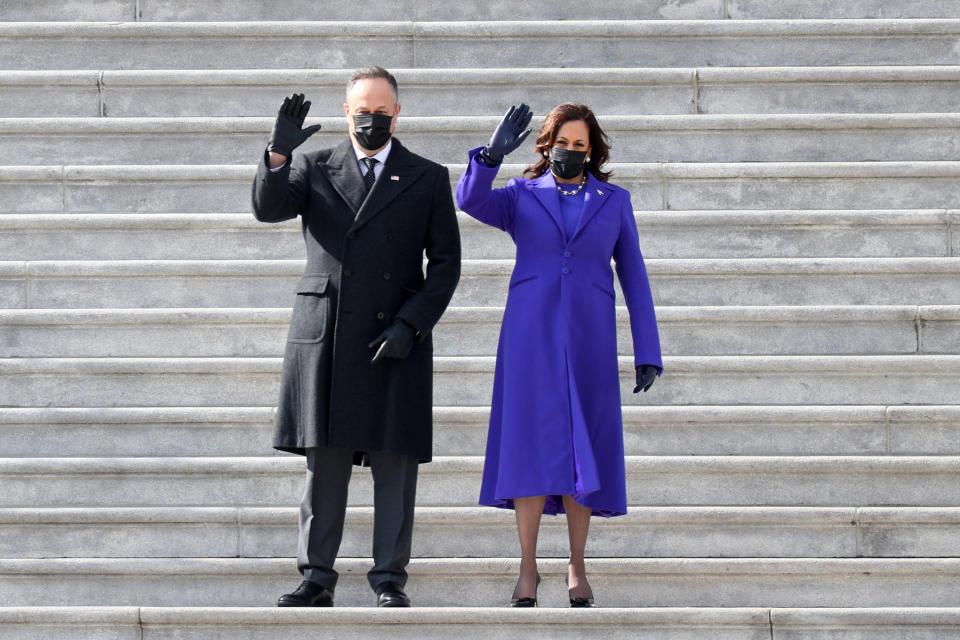 U.S. Vice President Kamala Harris and First Gentleman Douglas Emhoff wave to former U.S. Vice President Mike Pence after the inauguration of U.S. President Joe Biden at the U.S. Capitol on January 20, 2021 in Washington, DC.  During today's inauguration ceremony Joe Biden becomes the 46th president of the United States.