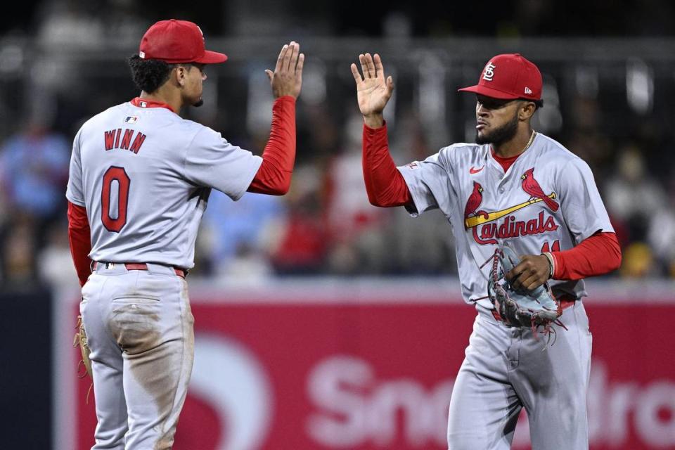 Apr 1, 2024; San Diego, California, USA; St. Louis Cardinals center fielder Victor Scott II (11) and shortstop Masyn Winn (0) celebrate on the field after defeating the <a class="link " href="https://sports.yahoo.com/mlb/teams/san-diego/" data-i13n="sec:content-canvas;subsec:anchor_text;elm:context_link" data-ylk="slk:San Diego Padres;sec:content-canvas;subsec:anchor_text;elm:context_link;itc:0">San Diego Padres</a> at Petco Park. Mandatory Credit: Orlando Ramirez-USA TODAY Sports Orlando Ramirez/USA TODAY NETWORK