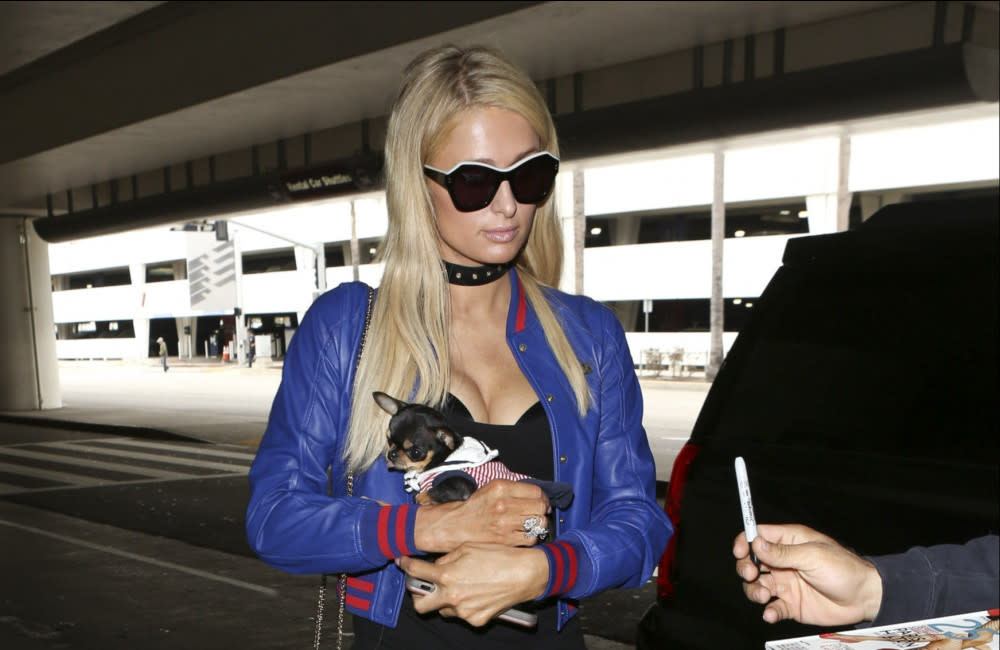 Paris Hilton and her dog Diamond Baby June 2017 Avalon