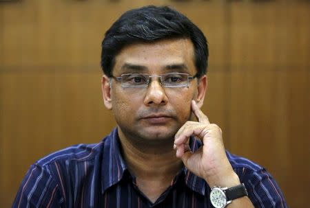 Samit Aich, executive director of Greenpeace India, listens to a reporter's question during a news conference in New Delhi, India, May 21, 2015. REUTERS/Adnan Abidi