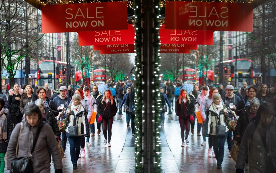 The street has traditionally been thronged with Christmas shoppers under the annual lights - PA