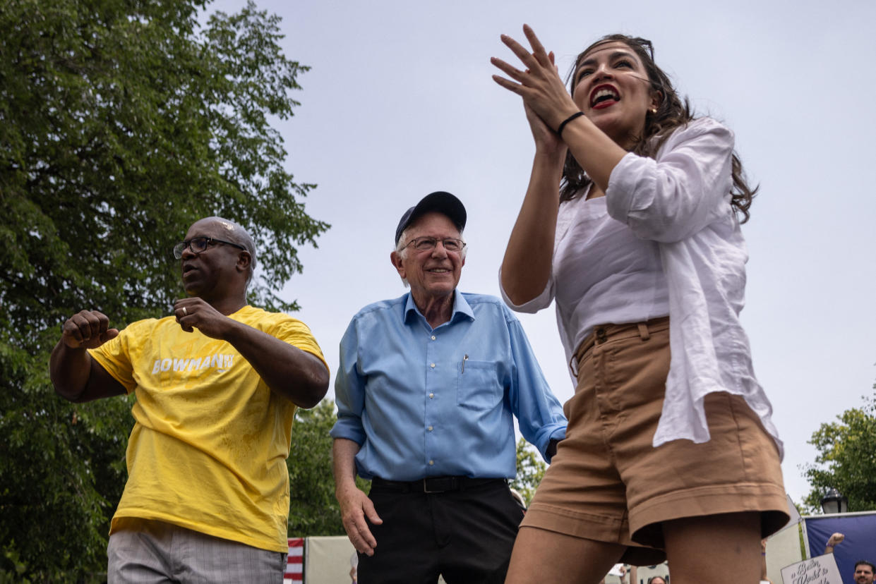 Jamaal Bowman is joined by Rep. Alexandria Ocasio-Cortez and Sen. Bernie Sanders at a rally in New York.