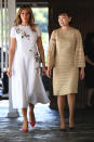 Melania Trump made sure to dress diplomatically for the day in a £5,847 Carolina Herrera dress finished with punchy heels. [Photo: Getty]