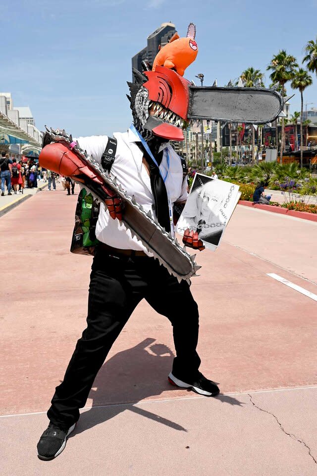 A cosplayer dressed as Chainsaw man poses for a photo at Comic Con News  Photo - Getty Images