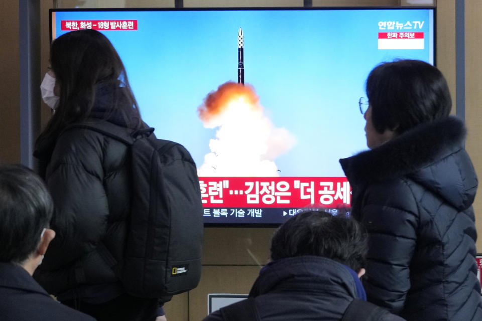 A TV screen shows an image of North Korea's missile launch during a news program at the Seoul Railway Station in Seoul, South Korea, Tuesday, Dec. 19, 2023. North Korean leader Kim Jong Un threatened “more offensive actions” to repel what he called increasing U.S.-led military threats after he supervised the third test of his country’s most advanced missile designed to strike the mainland U.S., state media reported Tuesday. (AP Photo/Ahn Young-joon)