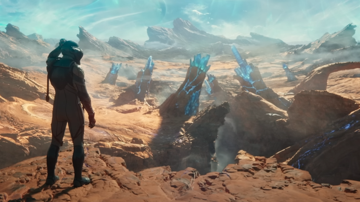  A character from the Outer Worlds 2 trailer scratches their own head, as their silhouetted design hasn't been designed on by the developers yet. The chasm looks pretty, though. 