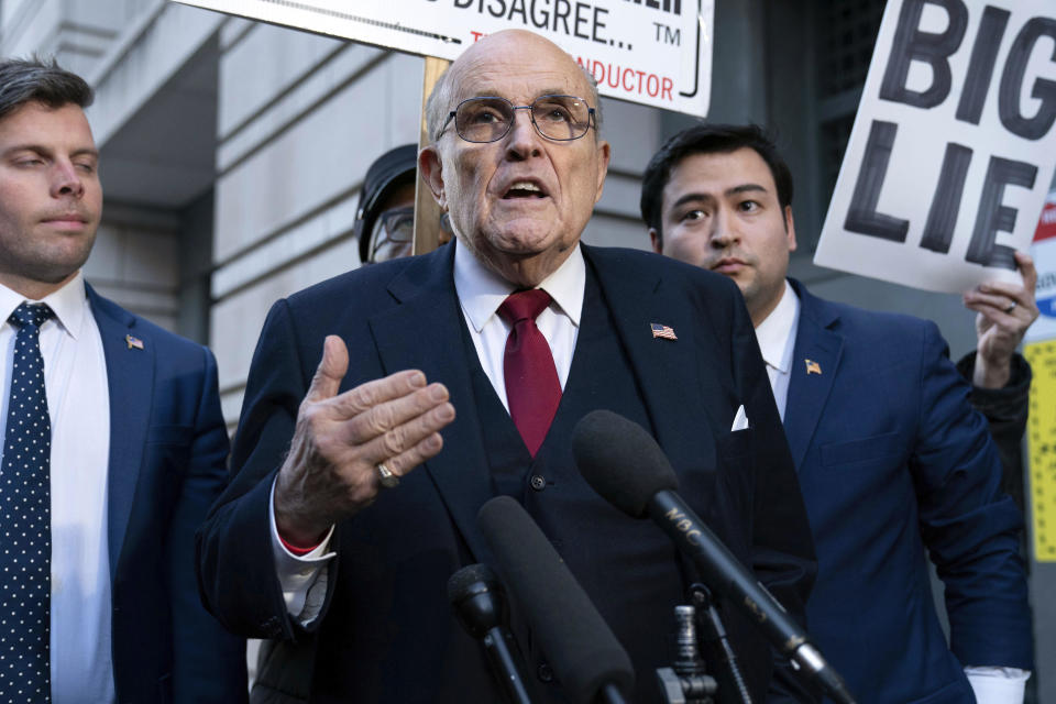 Rudy Giuliani speaks to reporters outside the federal courthouse in Washington, D.C., on Friday, Dec. 15, 2023. / Credit: Jose Luis Magana / AP